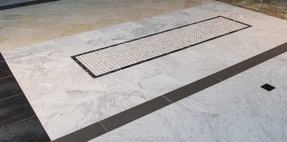 Arabescato Carrara with Black Marble Basket Weave Pattern Honed in a Mesh